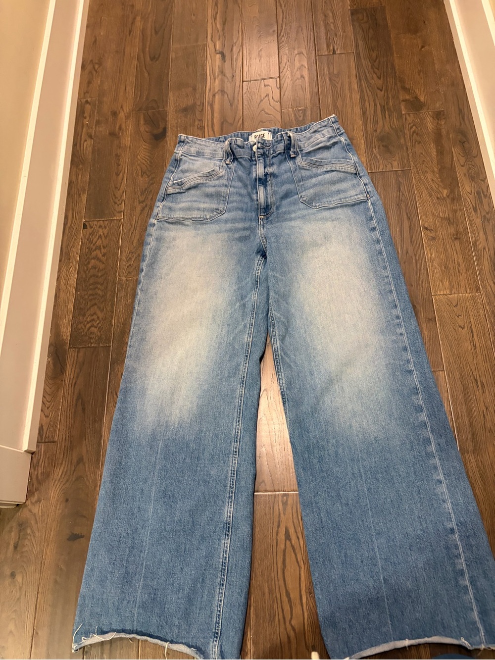 PAIGE Anessa Wide-Leg Jeans with Utility Pockets.